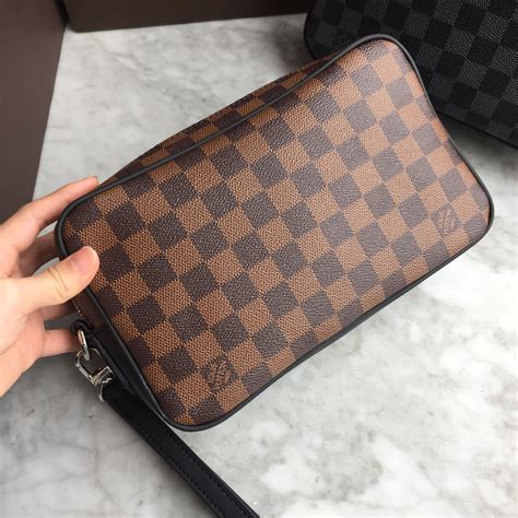 lv vintage clutch bag|lv clutch bags men's.